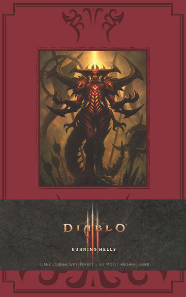 Large hardcover Diablo Burning Hells journal by Insight Editions with dark, fiery artwork on the cover and blank pages inside.