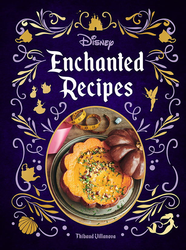 Hardcover Disney Enchanted Recipes Cookbook by Insight Editions showing colorful food illustrations and magical Disney-themed cover.