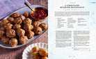 Hardcover of Disney Frozen: The Official Cookbook by Insight Editions, featuring colorful illustrations and recipe pages.