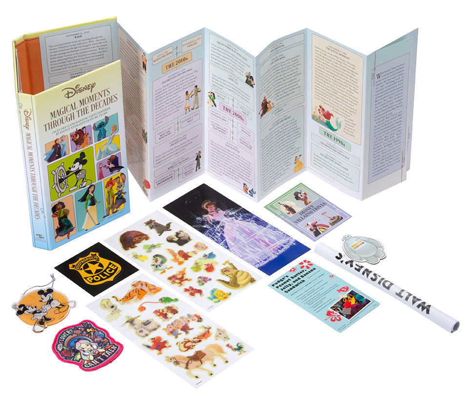 Hardcover book titled Disney: Magical Moments Through the Decades by Insight Editions featuring Disney characters and vintage illustrations.