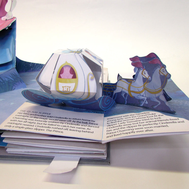 Hardcover copy of Disney Princess: A Magical Pop-Up World by Insight Editions, featuring colorful princess scenes and intricate paper pop-ups.