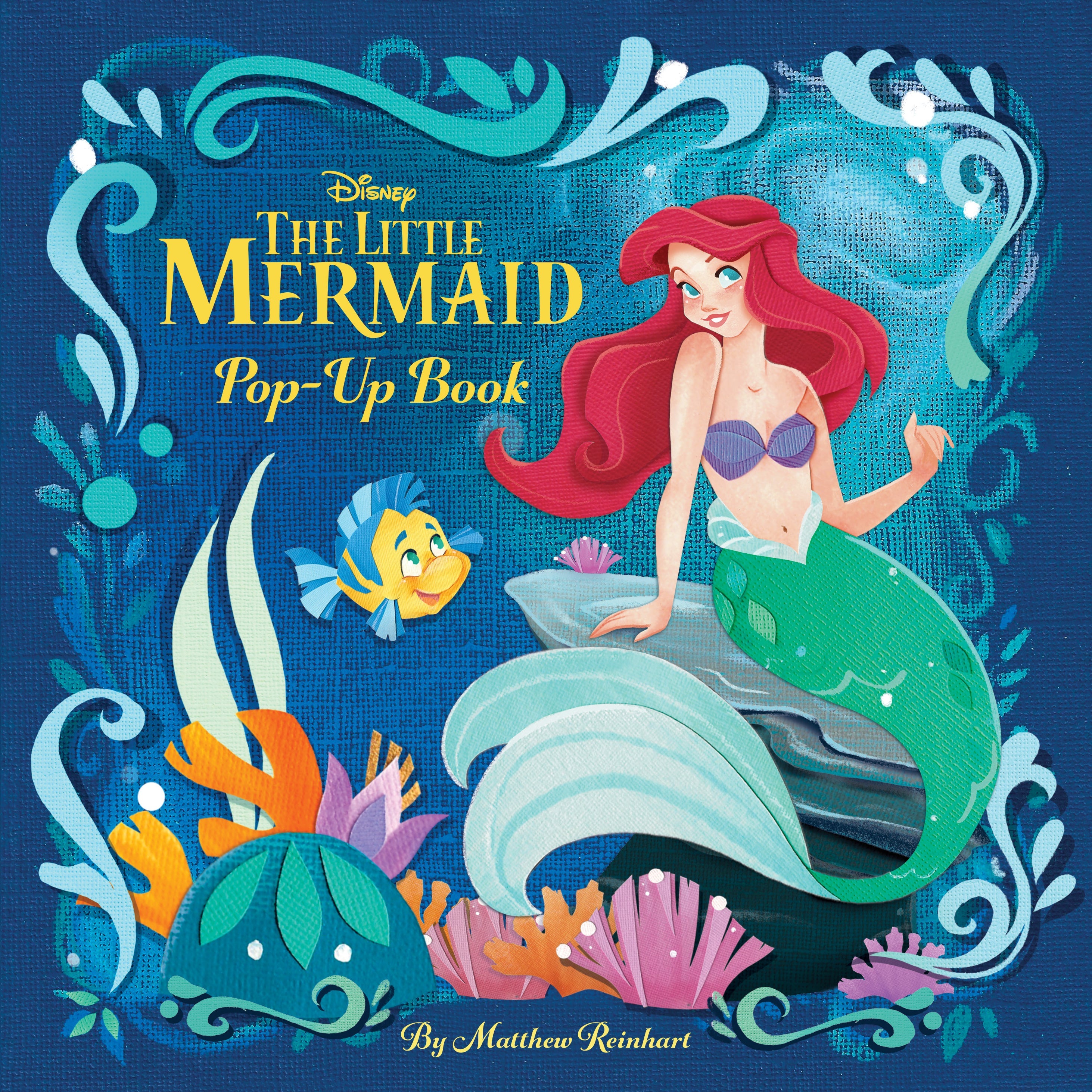 Hardcover Disney The Little Mermaid pop-up book by Insight Editions, featuring colorful underwater scenes and characters.