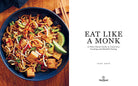 Hardcover copy of "Eat Like a Monk" cookbook by Insight Editions with a plain cover design.