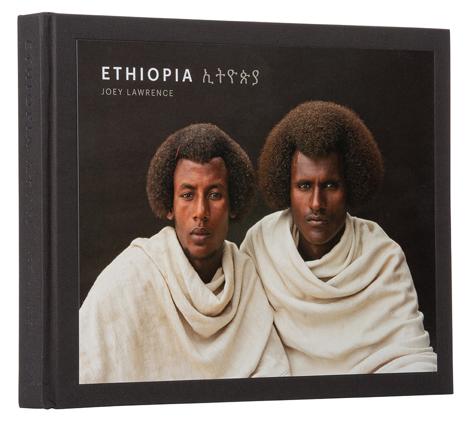 Hardcover book titled "Ethiopia" by Insight Editions, featuring vibrant cover art and detailed maps of Ethiopia.