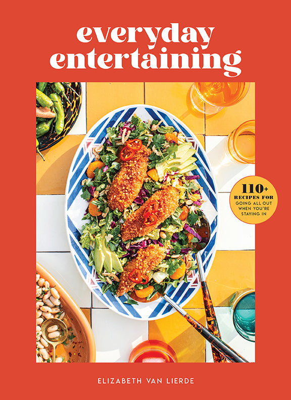 Hardcover book titled "Everyday Entertaining" by Insight Editions, featuring colorful interior pages and decorative cover design.
