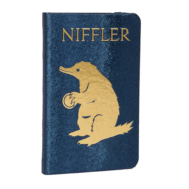 Hardcover Niffler Ruled Pocket Journal from Fantastic Beasts: The Crimes of Grindelwald by Insight Editions. Illustrated cover with Niffler design.