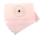 Hardcover book titled "Filled with Gratitude" by Insight Editions, featuring a decorative cover with warm tones.