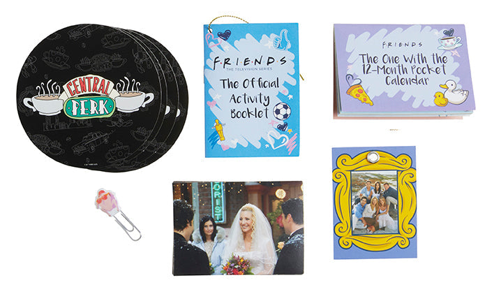 Hardcover of "Friends: The Official Advent Calendar, Volume 2" by Insight Editions, featuring festive themed images from the TV show.