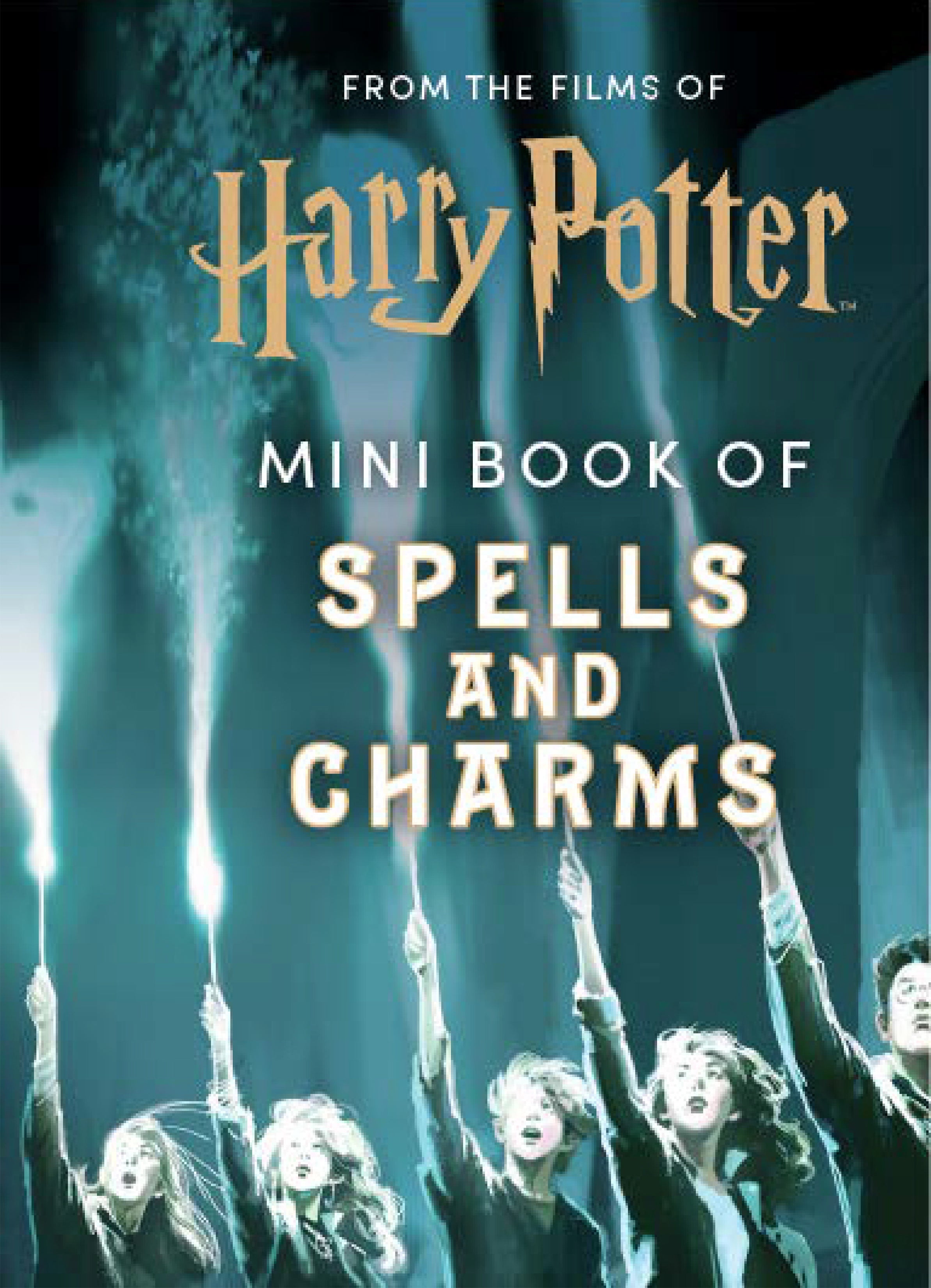 Hardcover Harry Potter mini book of spells and charms from Insight Editions, featuring magical illustrations and detailed spell descriptions.