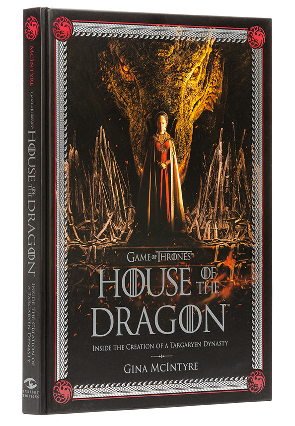 Hardcover copy of Game of Thrones: House of the Dragon book by Insight Editions, featuring a detailed cover illustration.