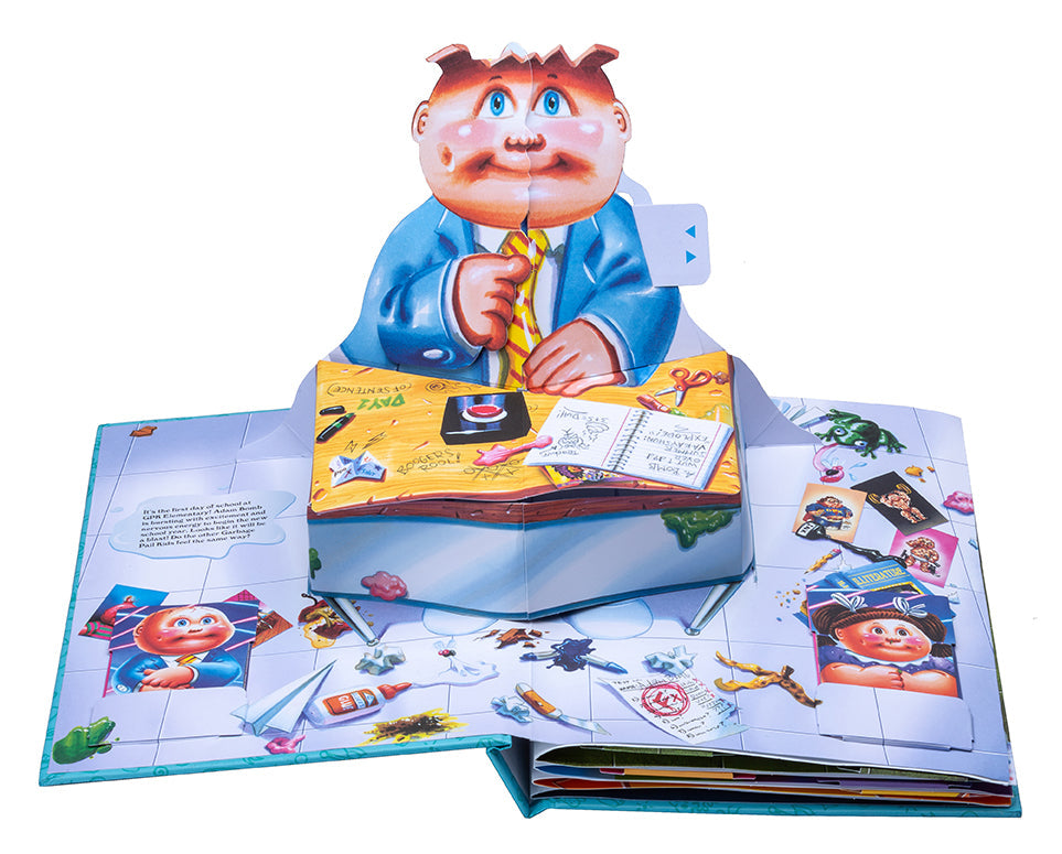Hardcover Garbage Pail Kids: The Ultimate Pop-Up Yearbook by Insight Editions featuring colorful pop-up illustrations inside.