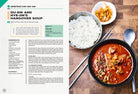 Hardcover Gastronogeek K-Drama Cookbook by Insight Editions featuring colorful Asian-inspired dishes and Korean cuisine recipes.