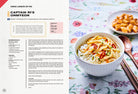 Hardcover Gastronogeek K-Drama Cookbook by Insight Editions featuring colorful Korean dishes and recipe pages.