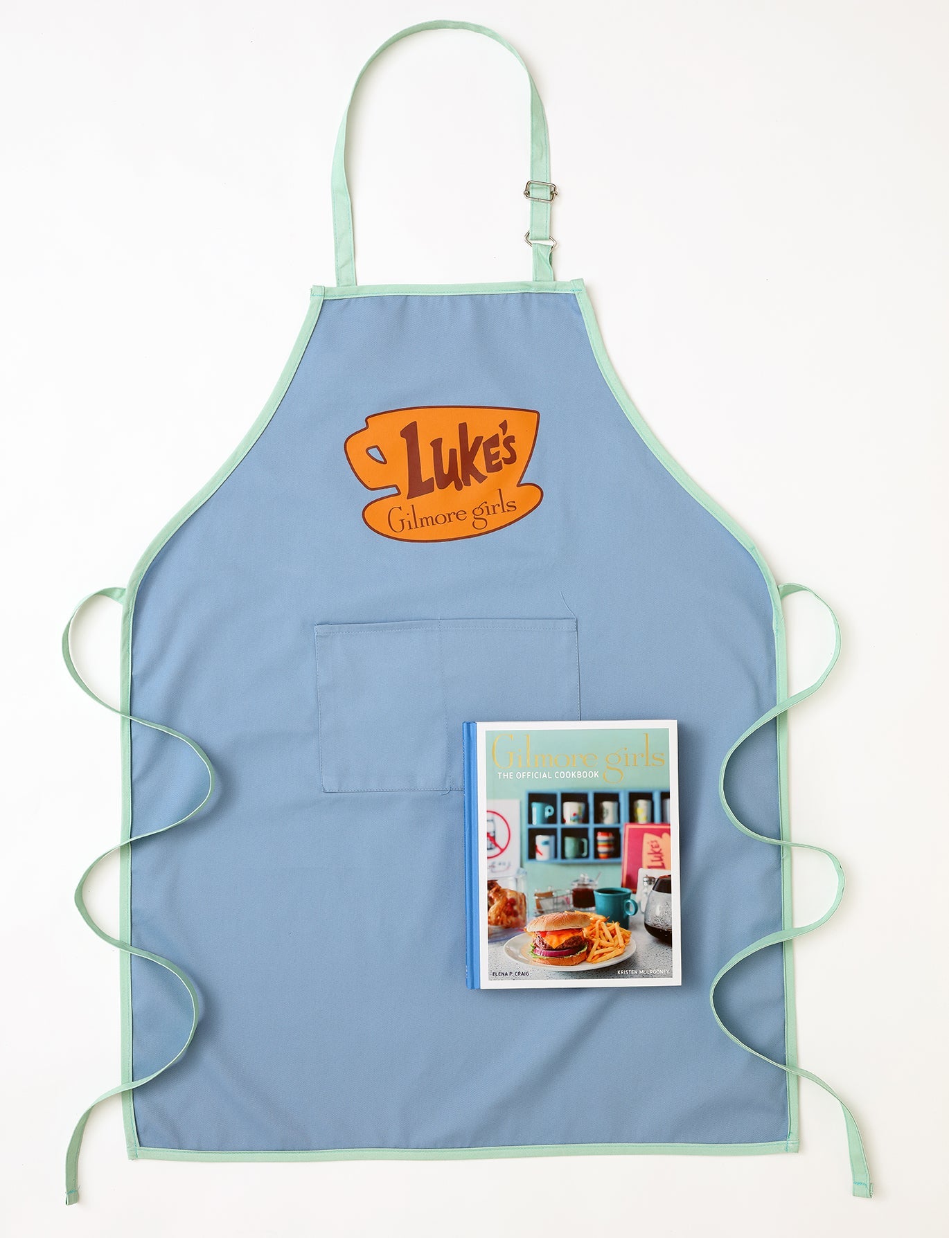 Hardcover Gilmore Girls: The Official Cookbook Gift Set by Insight Editions, featuring themed recipes and a decorative cookbook cover.