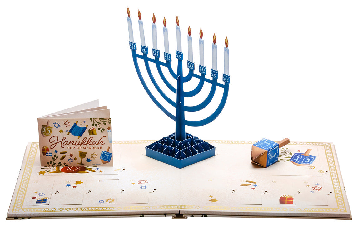 Hardcover Hanukkah Pop-Up Menorah by Insight Editions featuring colorful, intricate paper menorah design with lit candles.