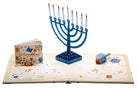 Hardcover Hanukkah Pop-Up Menorah by Insight Editions featuring colorful, intricate paper menorah design with lit candles.