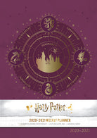 Hardcover Harry Potter 2020-2021 Weekly Planner by Insight Editions featuring magical design and weekly layout pages.