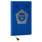 Harry Potter Chocolate Frog journal with ribbon charm, hardcover notebook by Insight Editions featuring Harry Potter-themed design and gold accents.