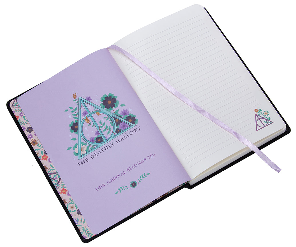 Hardcover Harry Potter Deathly Hallows embroidered journal with magical design, by Insight Editions, featuring detailed stitching and branding.