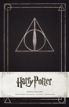 Hardcover Harry Potter Deathly Hallows ruled journal by Insight Editions with magical design on the cover.
