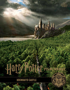 Hardcover Harry Potter: Film Vault Volume 6 book by Insight Editions, featuring detailed film memorabilia and artwork.