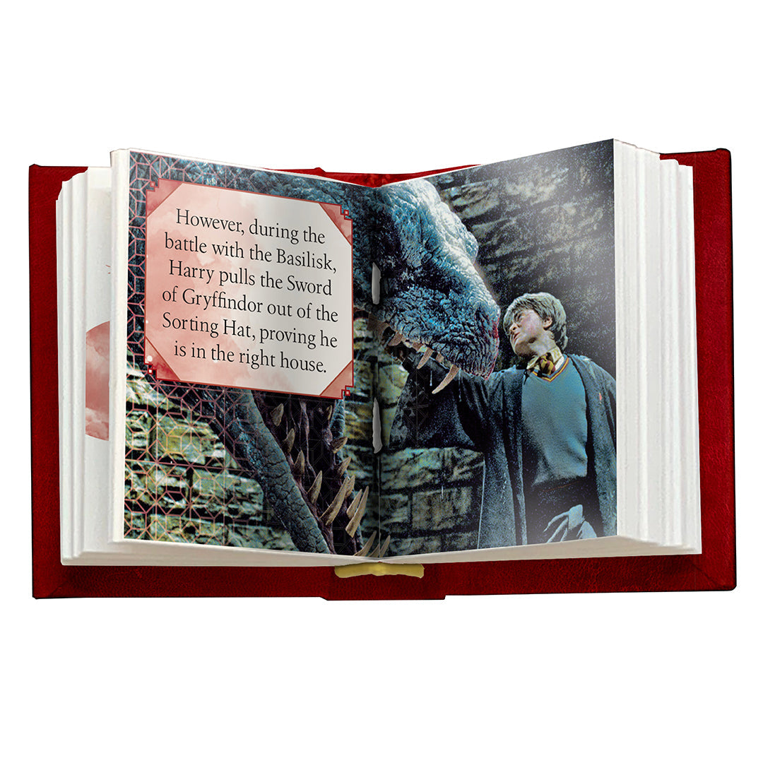 Hardcover Harry Potter Gryffindor book by Insight Editions with gold-embossed Gryffindor crest on the cover.