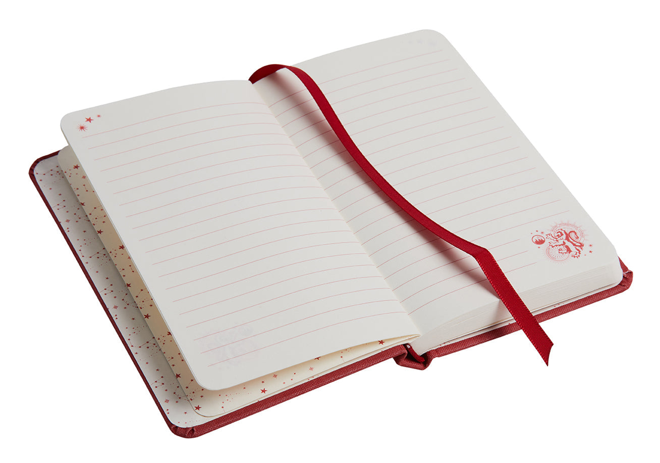 Hardcover Harry Potter Gryffindor Constellation ruled pocket journal by Insight Editions with magical constellation cover design.