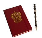 Gryffindor hardcover journal with gold embossed crest and Elder Wand pen set from Harry Potter by Insight Editions.