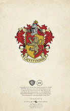 Hardcover Harry Potter Gryffindor ruled pocket journal by Insight Editions with house crest and gold accents.