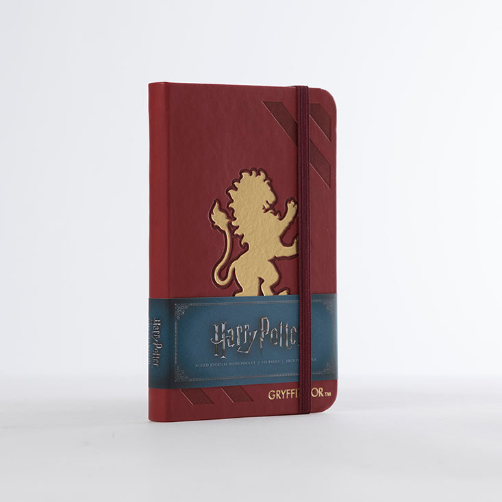 Hardcover Harry Potter Gryffindor ruled pocket journal by Insight Editions, featuring a Gryffindor crest cover design.
