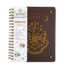 Hardcover Harry Potter Hogwarts 12-Month Undated Planner by Insight Editions with magical design on the cover.