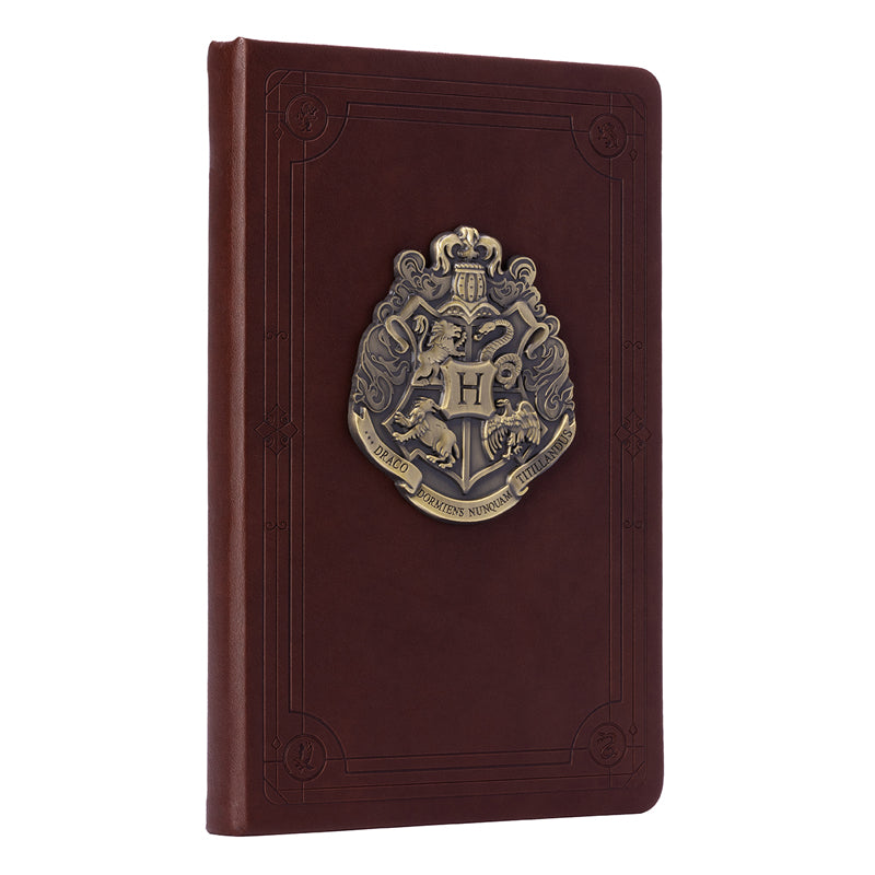 Harry Potter Hogwarts Crest hardcover journal by Insight Editions, featuring the iconic crest on the front cover.