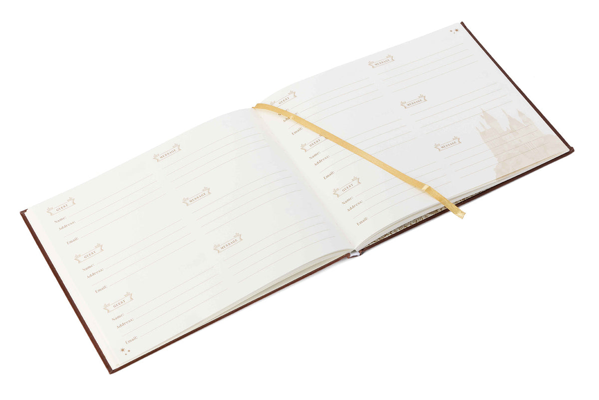 Interior view of the hardcover Harry Potter Hogwarts Guest Book by Insight Editions, featuring lined pages for guest signatures.