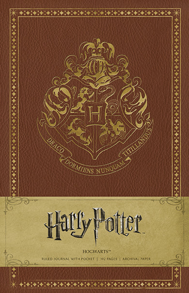 Harry Potter Hogwarts hardcover ruled journal by Insight Editions with magical Hogwarts design on the cover.