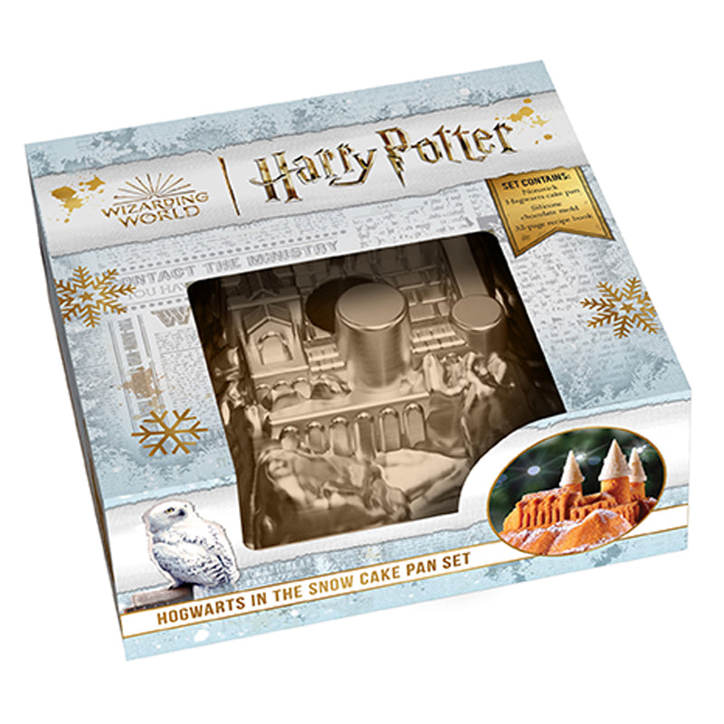 Hardcover Harry Potter: Hogwarts in the Snow Cake Pan Set by Insight Editions showing the festive snow-themed Hogwarts design.