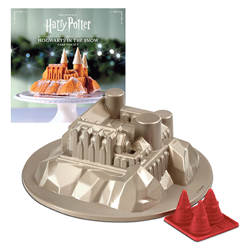 Hardcover Harry Potter: Hogwarts in the Snow cake pan set from Insight Editions, featuring magical Hogwarts castle design.