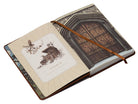 Hardcover Harry Potter Hogwarts Legacy Journal by Insight Editions with embossed Hogwarts crest on the cover.