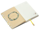 Hardcover Harry Potter Hogwarts Magical World Journal by Insight Editions with ribbon charm and enchanting cover design.