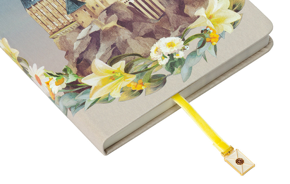 Hardcover Harry Potter Hogwarts Magical World Journal by Insight Editions with ribbon charm and detailed cover design.