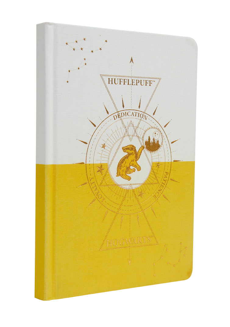Harry Potter Hufflepuff constellation hardcover ruled journal by Insight Editions with celestial Hufflepuff design on the cover.