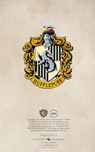 Hardcover Harry Potter Hufflepuff ruled pocket journal by Insight Editions featuring Hufflepuff crest and gold accents.