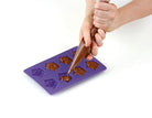 Hardcover Harry Potter "Make Your Own Chocolate Frogs" kit by Insight Editions with illustrated packaging.