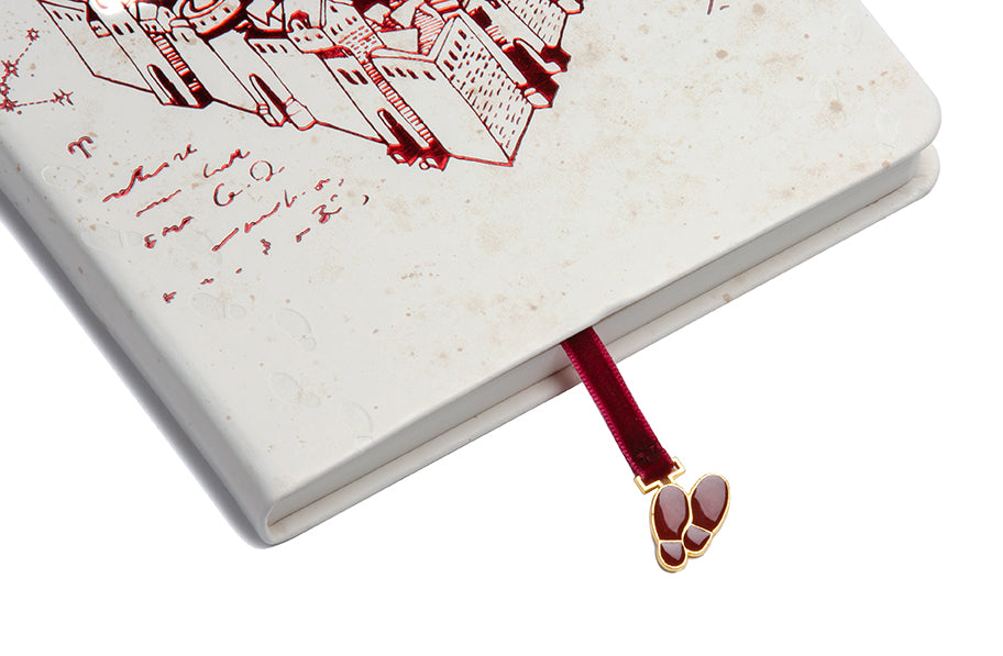 Hardcover Harry Potter Marauder's Map journal with ribbon charm, featuring detailed map design and gold accents by Insight Editions.