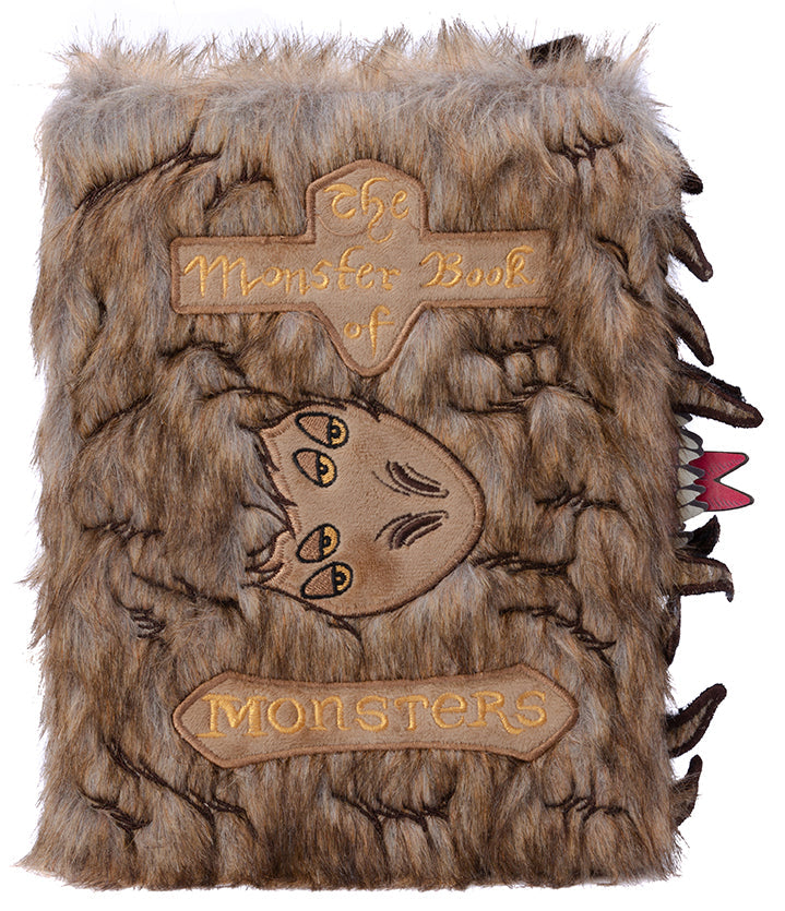 Hardcover Harry Potter Monster Book of Monsters plush journal by Insight Editions with detailed monster design and embossed cover.