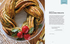 Hardcover of Harry Potter Official Christmas Cookbook by Insight Editions featuring festive recipes and magical illustrations.