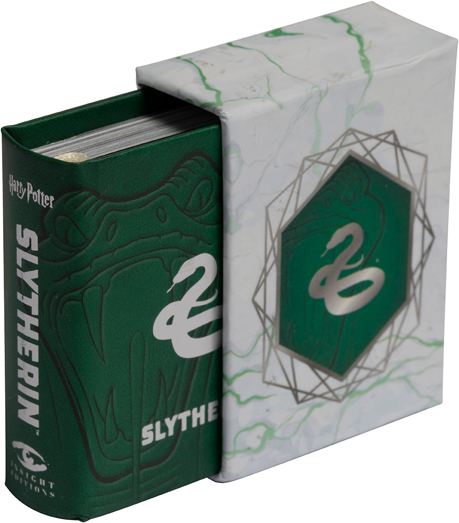 Hardcover Harry Potter Slytherin book by Insight Editions featuring the iconic Slytherin house crest and green cover design.