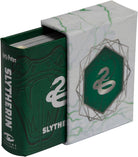 Hardcover Harry Potter Slytherin book by Insight Editions featuring the iconic Slytherin house crest and green cover design.