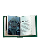 Hardcover Harry Potter Slytherin book by Insight Editions featuring the iconic Slytherin house emblem and detailed cover art.