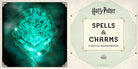 Hardcover Harry Potter: Spells and Charms movie scrapbook by Insight Editions, featuring magical spell illustrations and charms.