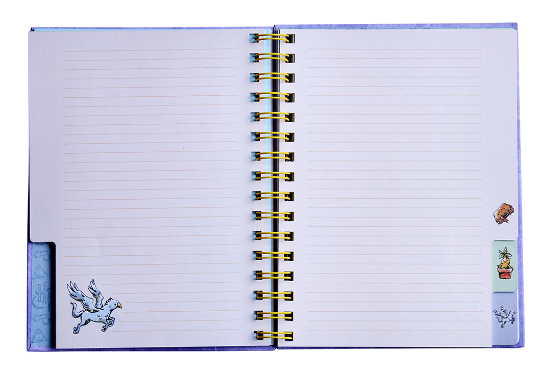 Hardcover Harry Potter spiral notebook by Insight Editions with magical-themed cover design.